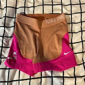 •tan & pink nike pro shorts•